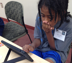 Student playing Math Snacks on iPad